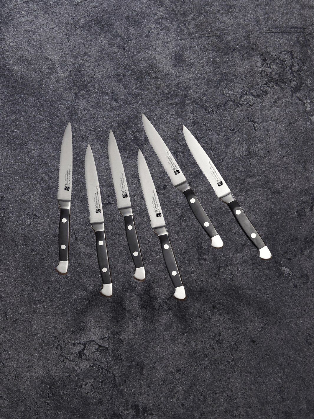 Couteau à Steak manche noir lustré